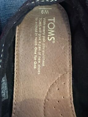 TOMS Slip-On Shoe in Black with Brown Insole
